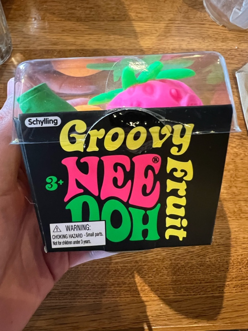 Schylling Groovy NeeDoh Fruit Toy - Pink & Green